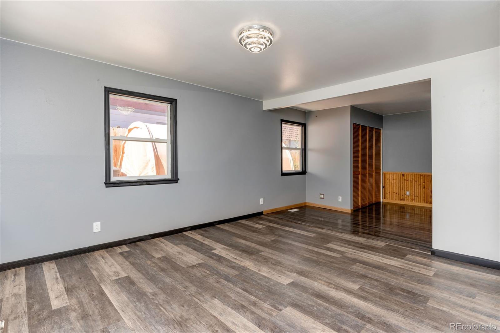 1781 Rowena Street Thornton, CO 80229 - Photo 6 of 21 a view of an empty room with a window