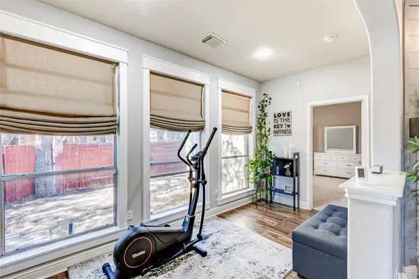 a view of a livingroom with furniture and windows