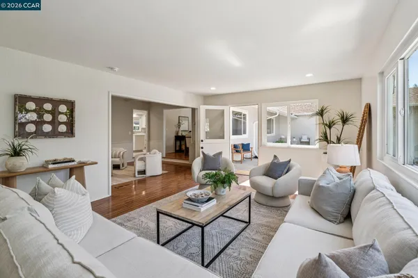 a bedroom with bed and a couch