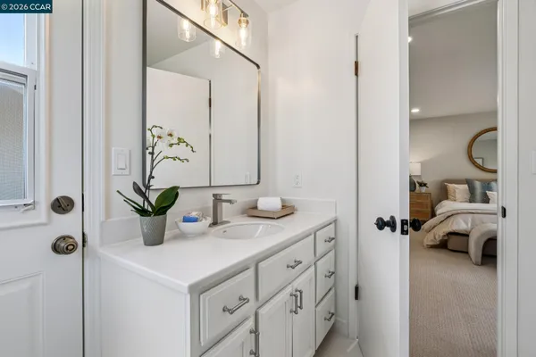 a workspace with furniture window and wooden floor