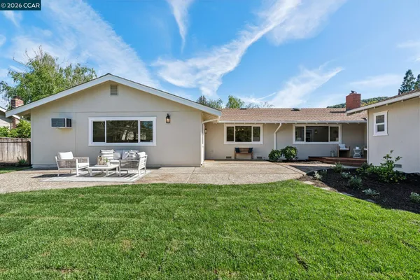 a front view of a house with a patio