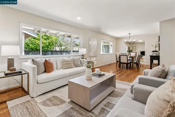 a view of a dining room and furniture window and outside view