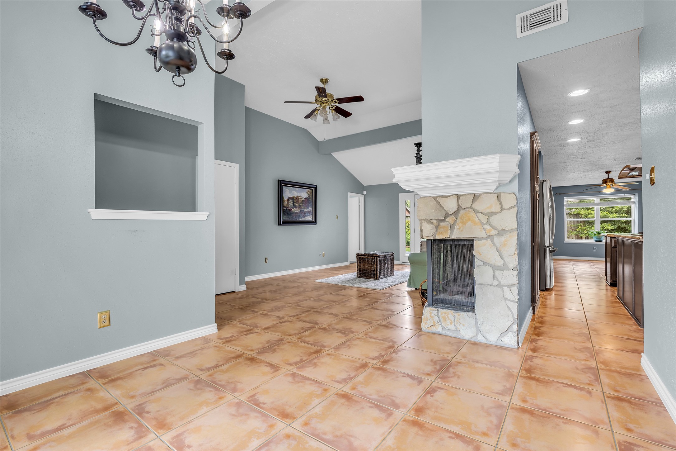 17314 Chapel Pine Street Spring, TX 77379 - Photo 7 of 44 View from the formal dining into the kitchen on the right and den on the left.