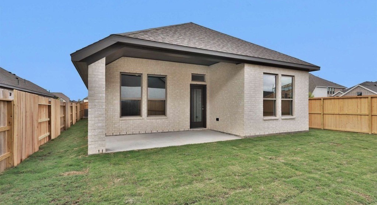 303 Eileen Drive Rosenberg, TX 77471 - Photo 16 of 17 a front view of a house with a yard