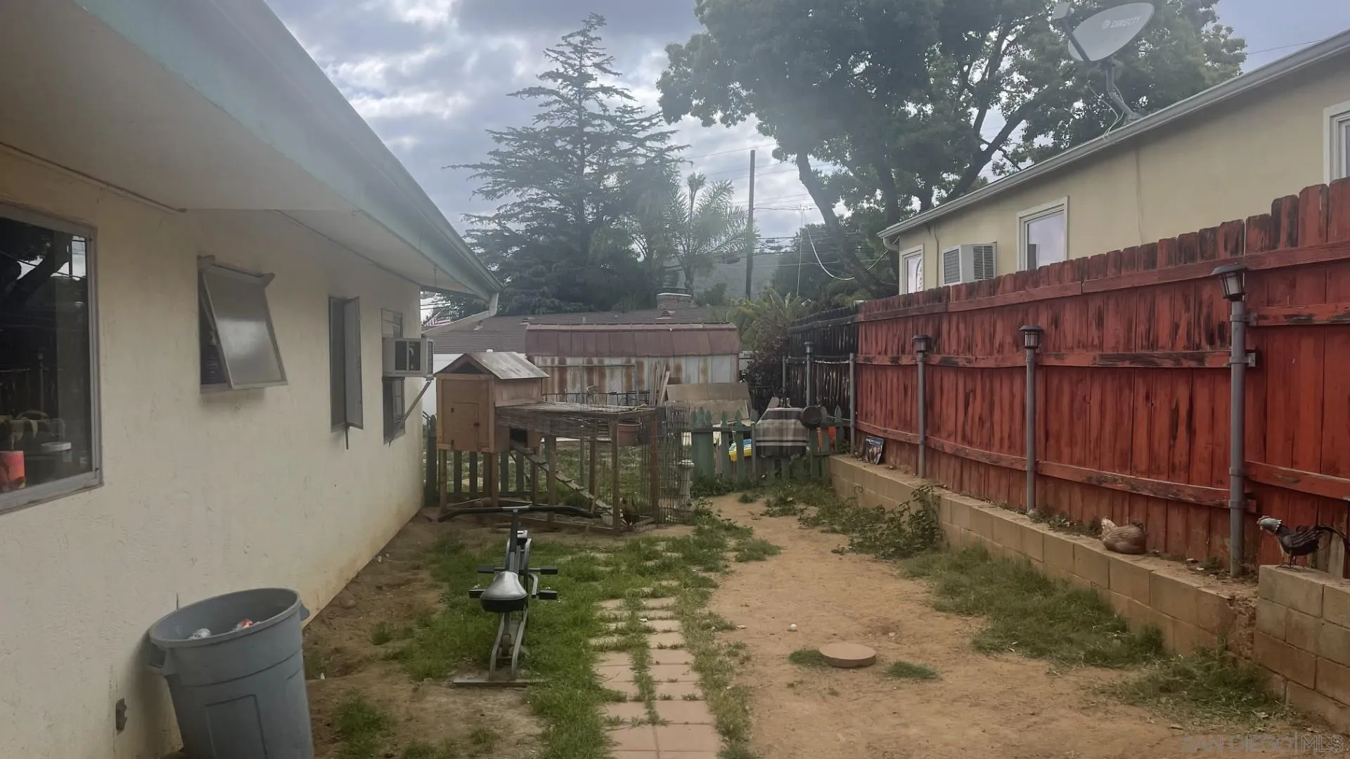 12378 Wade Way El Cajon, CA 92021 - Photo 13 of 13 a view of a house with backyard and sitting area