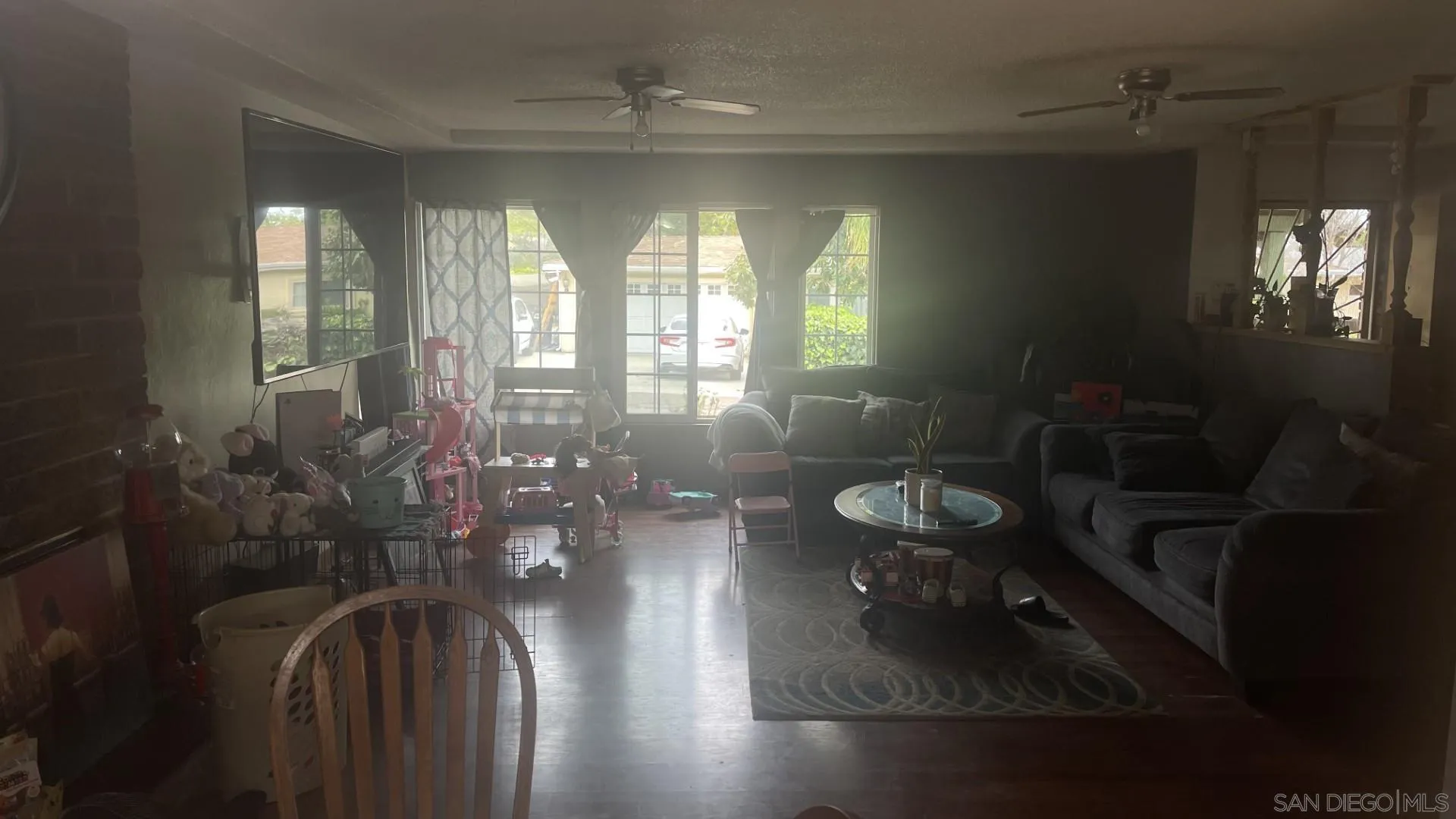 12378 Wade Way El Cajon, CA 92021 - Photo 7 of 13 a view of a livingroom with furniture window and wooden floor