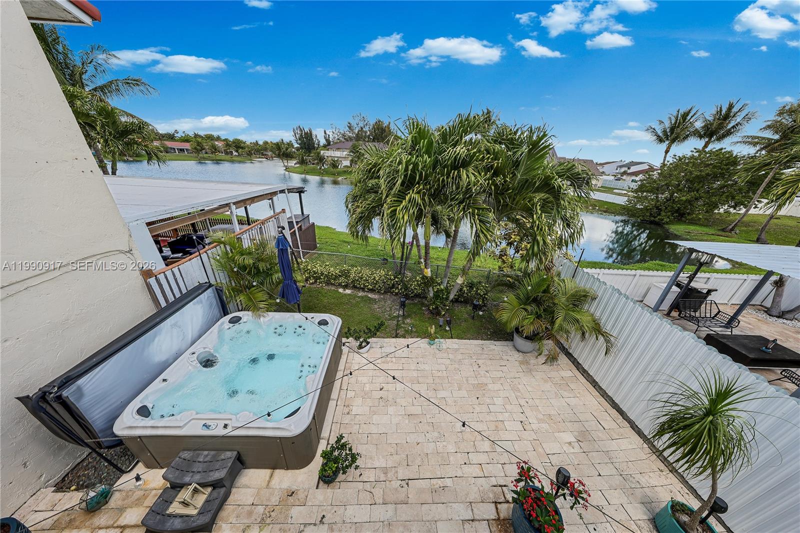 12511 Southwest 12th Lane Miami, FL 33184 - Photo 16 of 20 a view of a backyard with sitting area