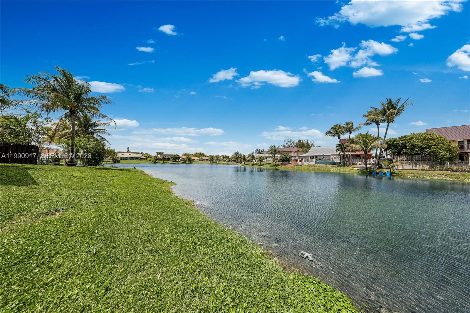 12511 Southwest 12th Lane Miami, FL 33184 - Photo 19 of 20 a view of a lake with outdoor space