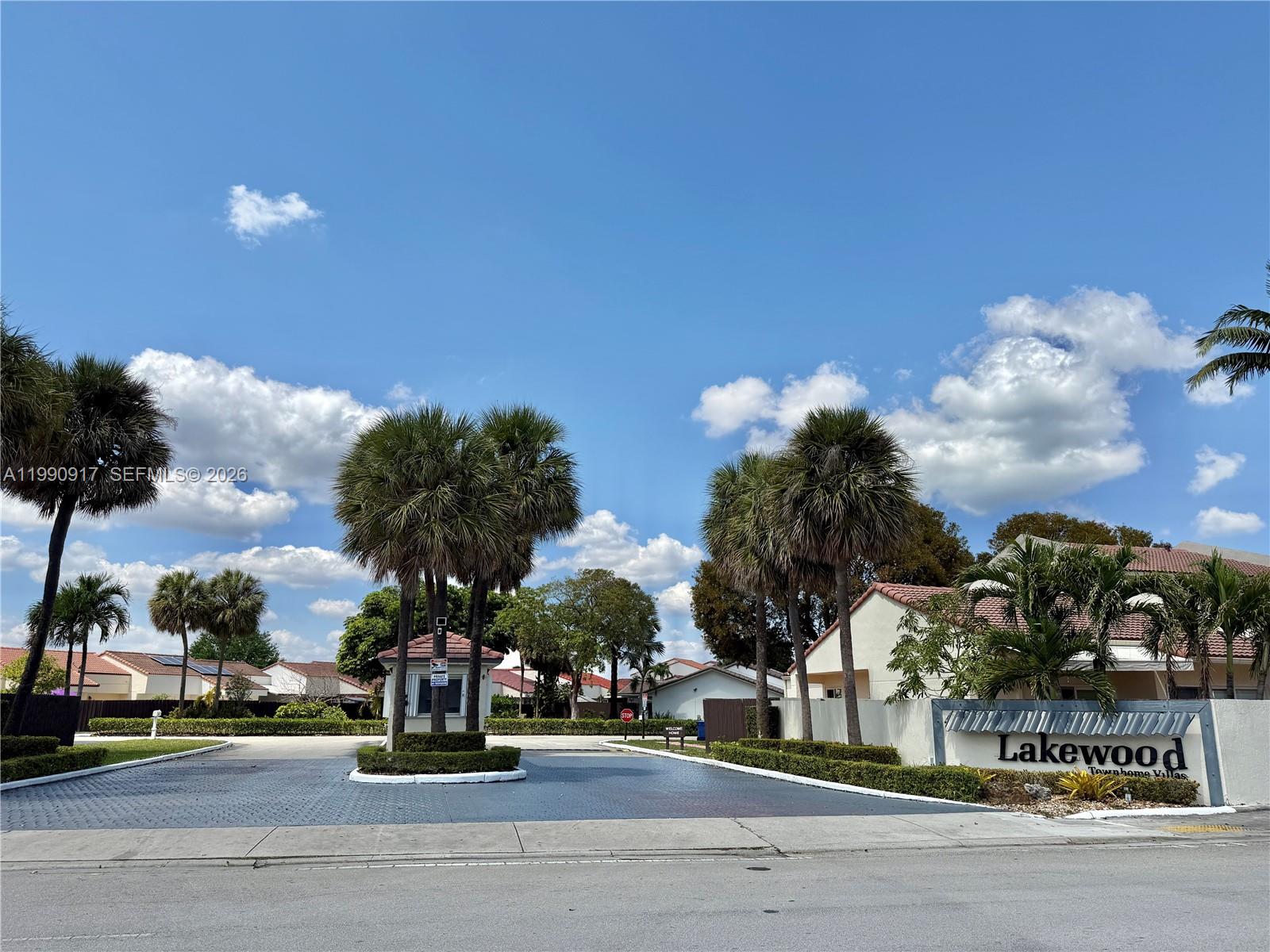 12511 Southwest 12th Lane Miami, FL 33184 - Photo 20 of 20 a view of a street with houses