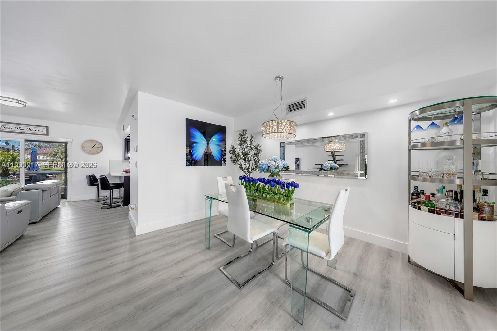 12511 Southwest 12th Lane Miami, FL 33184 - Photo 2 of 20 a view of a dining room with furniture and wooden floor