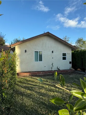 a house with river in front of it