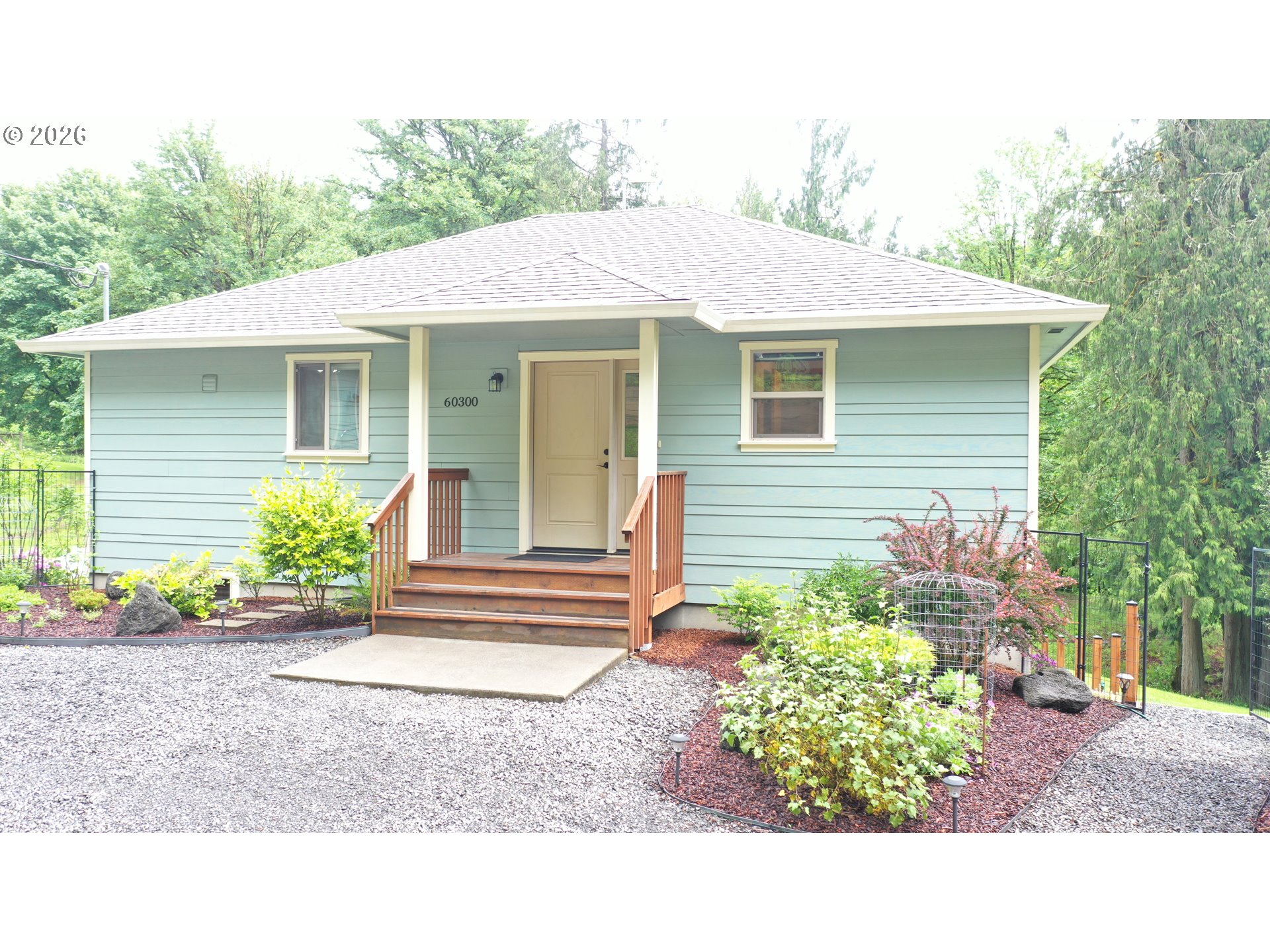 60300 Rays Way St. Helens, OR 97051 - Photo 1 of 41 a view of a house with potted plants