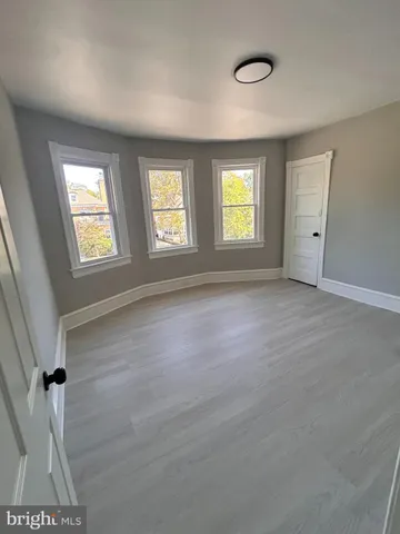 a view of livingroom with hardwood floor and window
