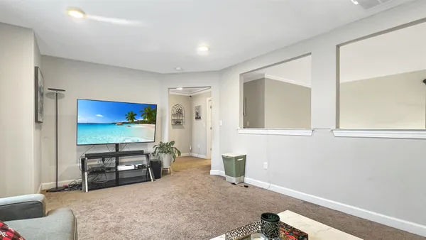 a workspace with furniture and window