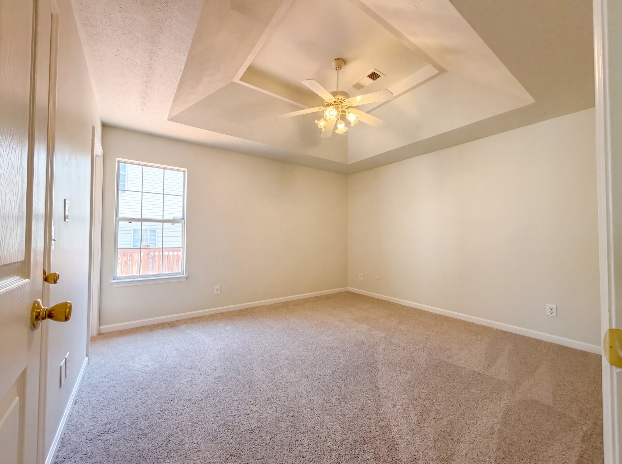 609 Sandy Spring Trail Madison, TN 37115 - Photo 4 of 16 an empty room with windows and fan