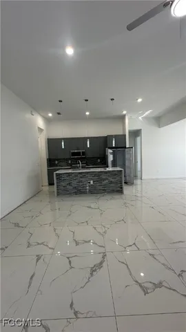 a view of kitchen with furniture