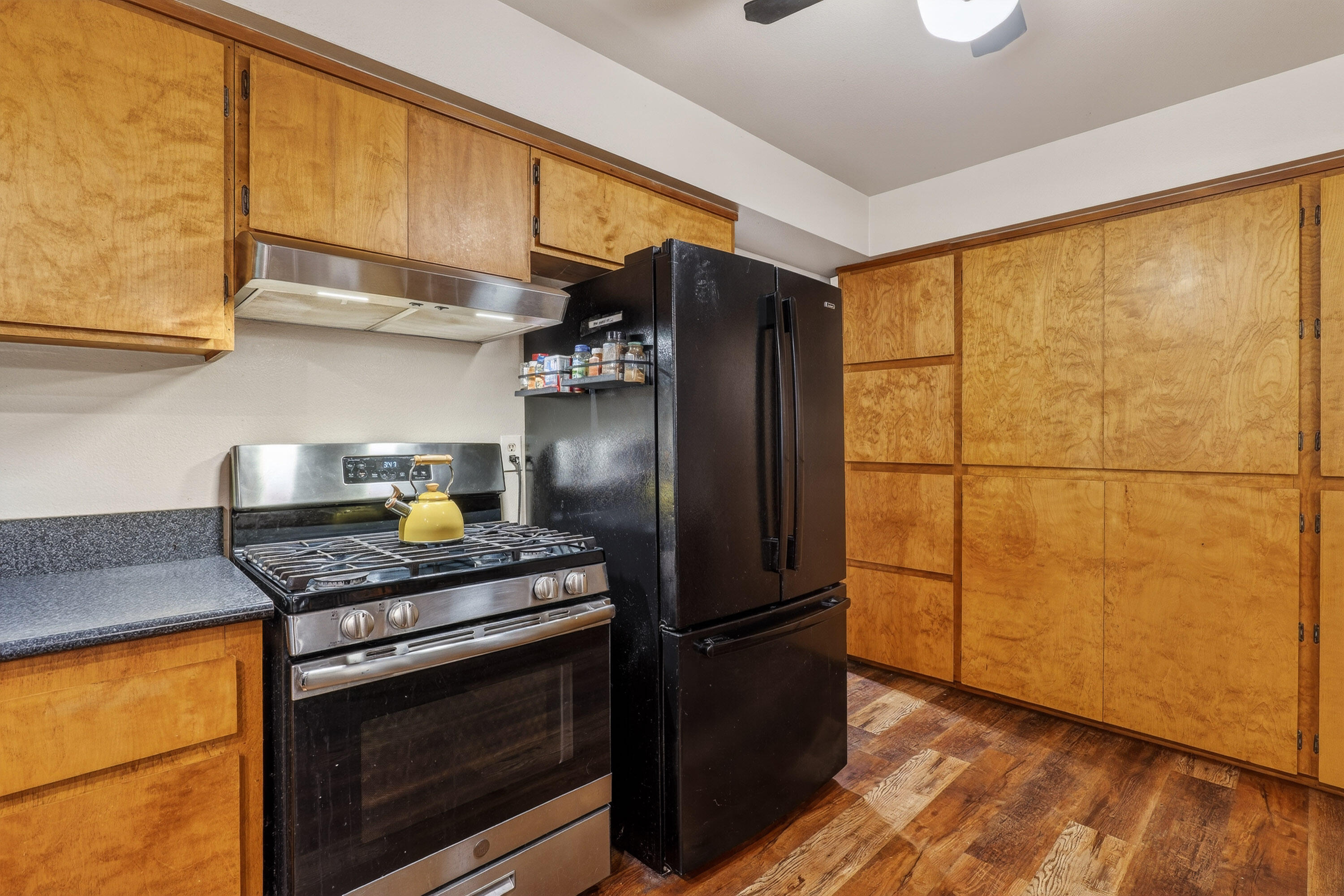 244 Riessen Road Grants Pass, OR 97526 - Photo 15 of 52 a kitchen with stainless steel appliances granite countertop a refrigerator sink and stove