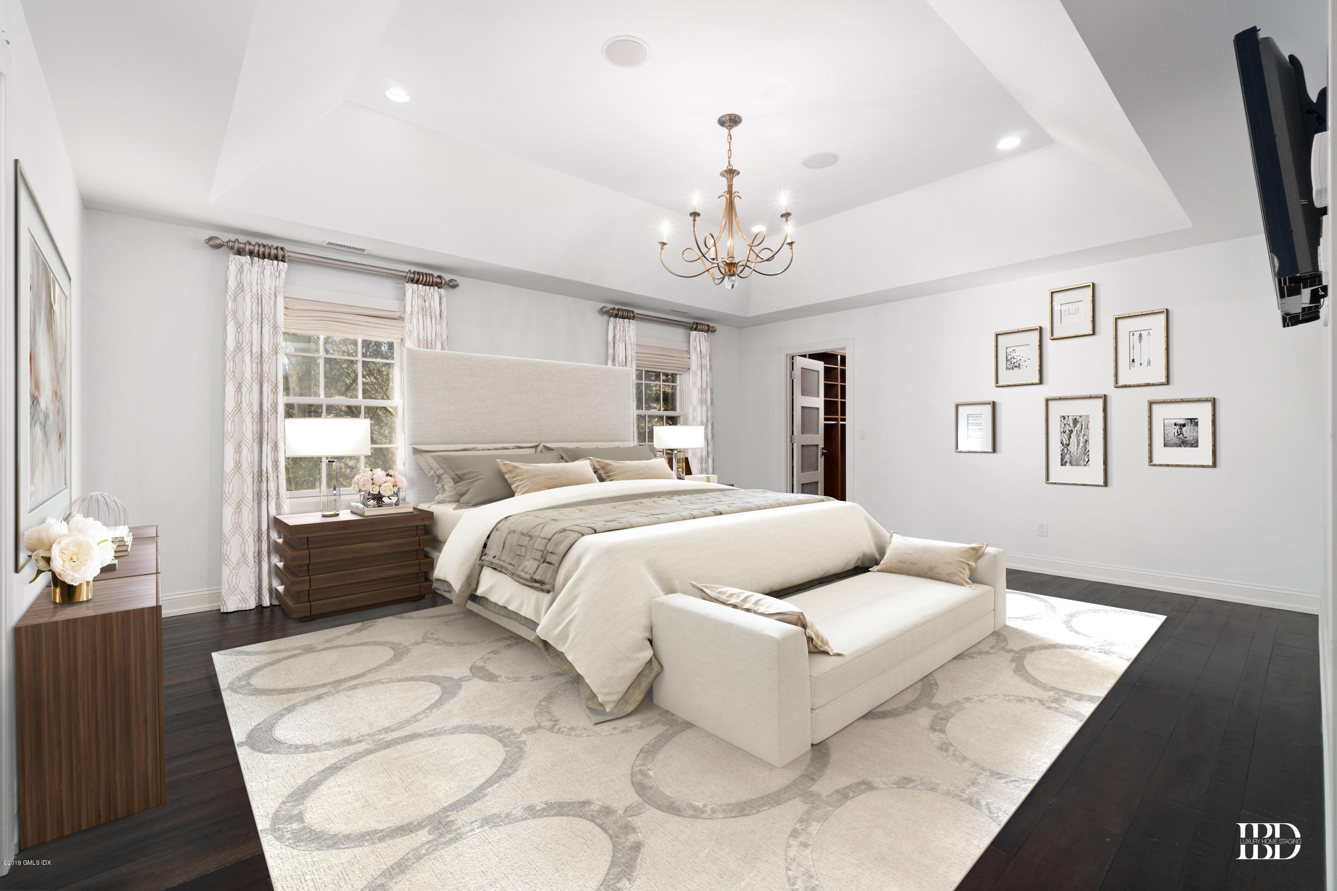 340 Valley Road, Unit 5 Cos Cob, CT 06807 - Photo 11 of 29 a bedroom with a large bed and a couch