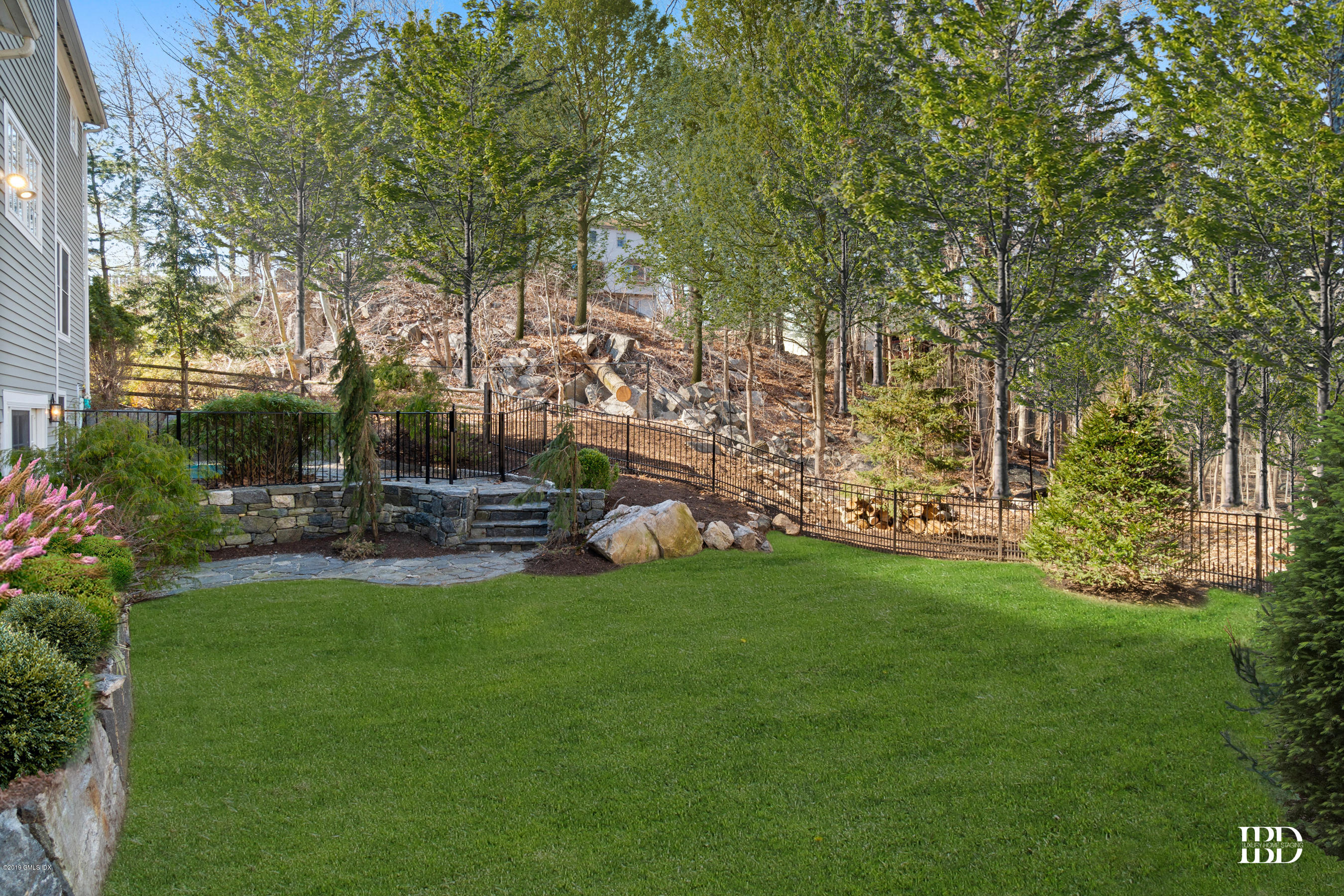 340 Valley Road, Unit 5 Cos Cob, CT 06807 - Photo 21 of 29 a view of yard with green space