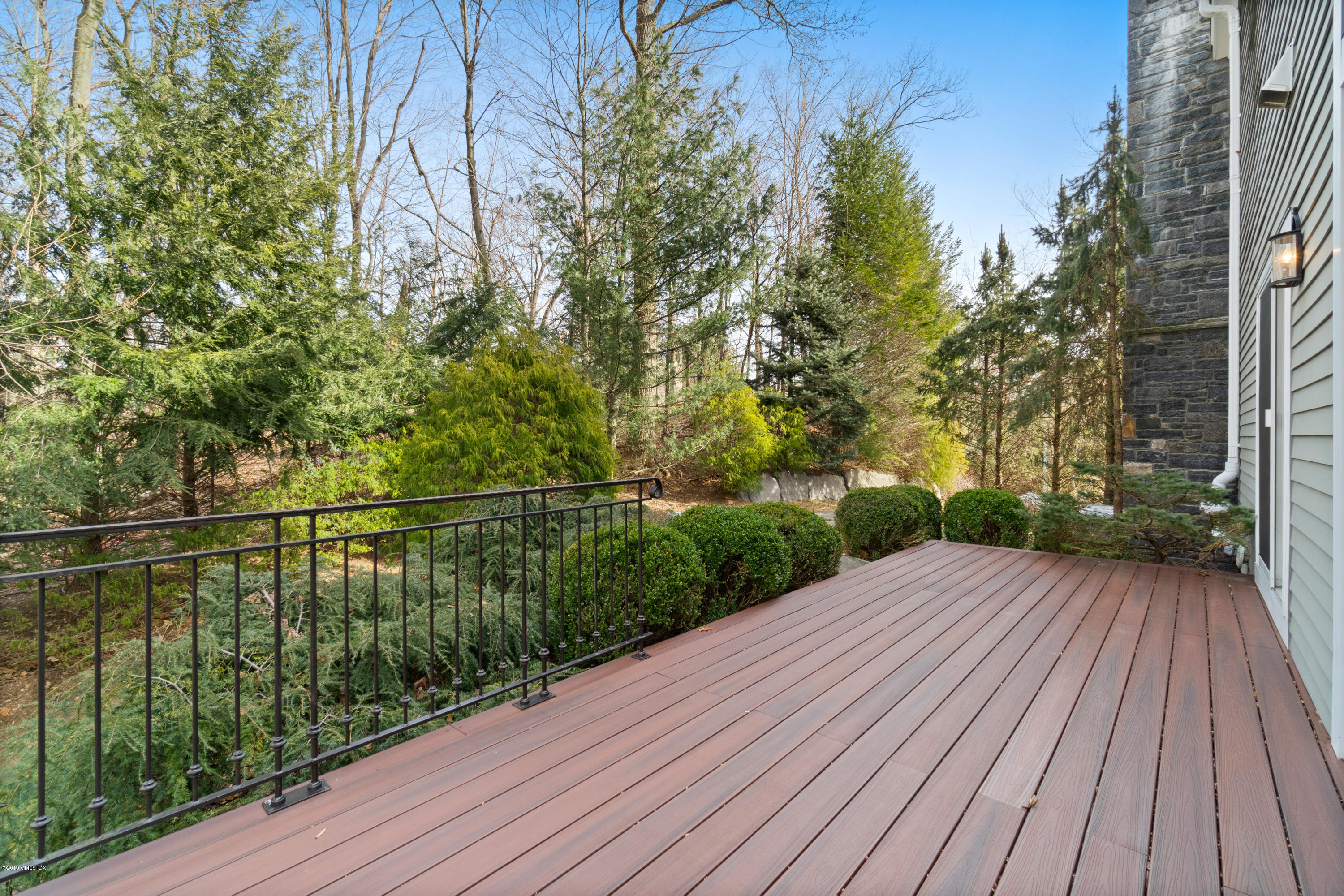 340 Valley Road, Unit 5 Cos Cob, CT 06807 - Photo 22 of 29 a view of balcony with wooden floor