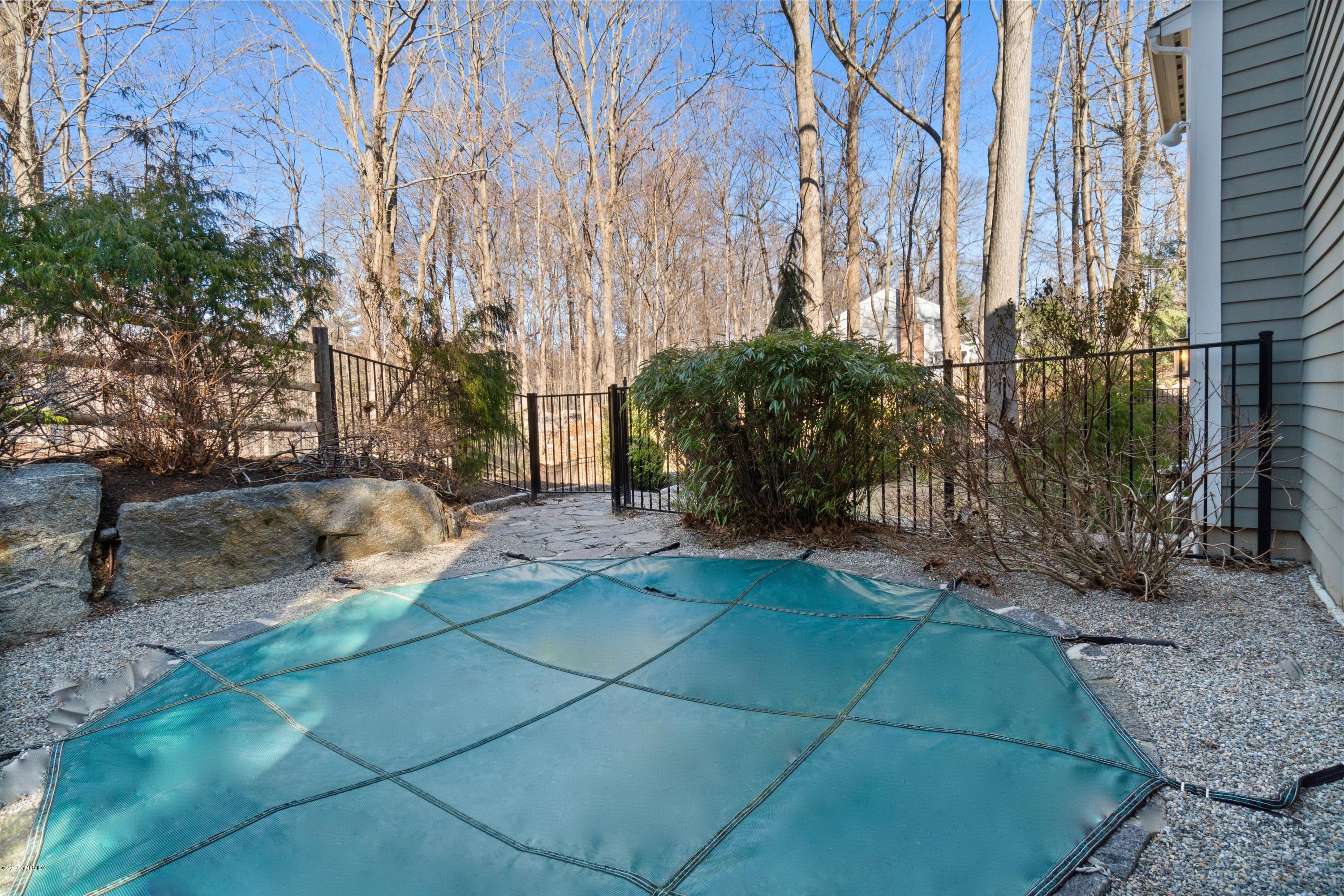 340 Valley Road, Unit 5 Cos Cob, CT 06807 - Photo 23 of 29 a view of a back yard