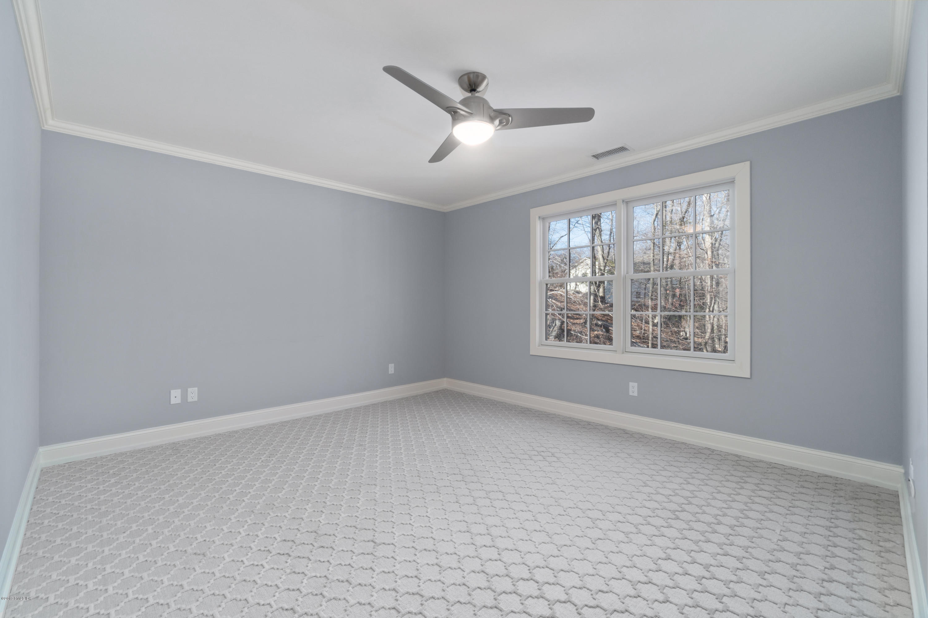 340 Valley Road, Unit 5 Cos Cob, CT 06807 - Photo 24 of 29 a view of an empty room with a window