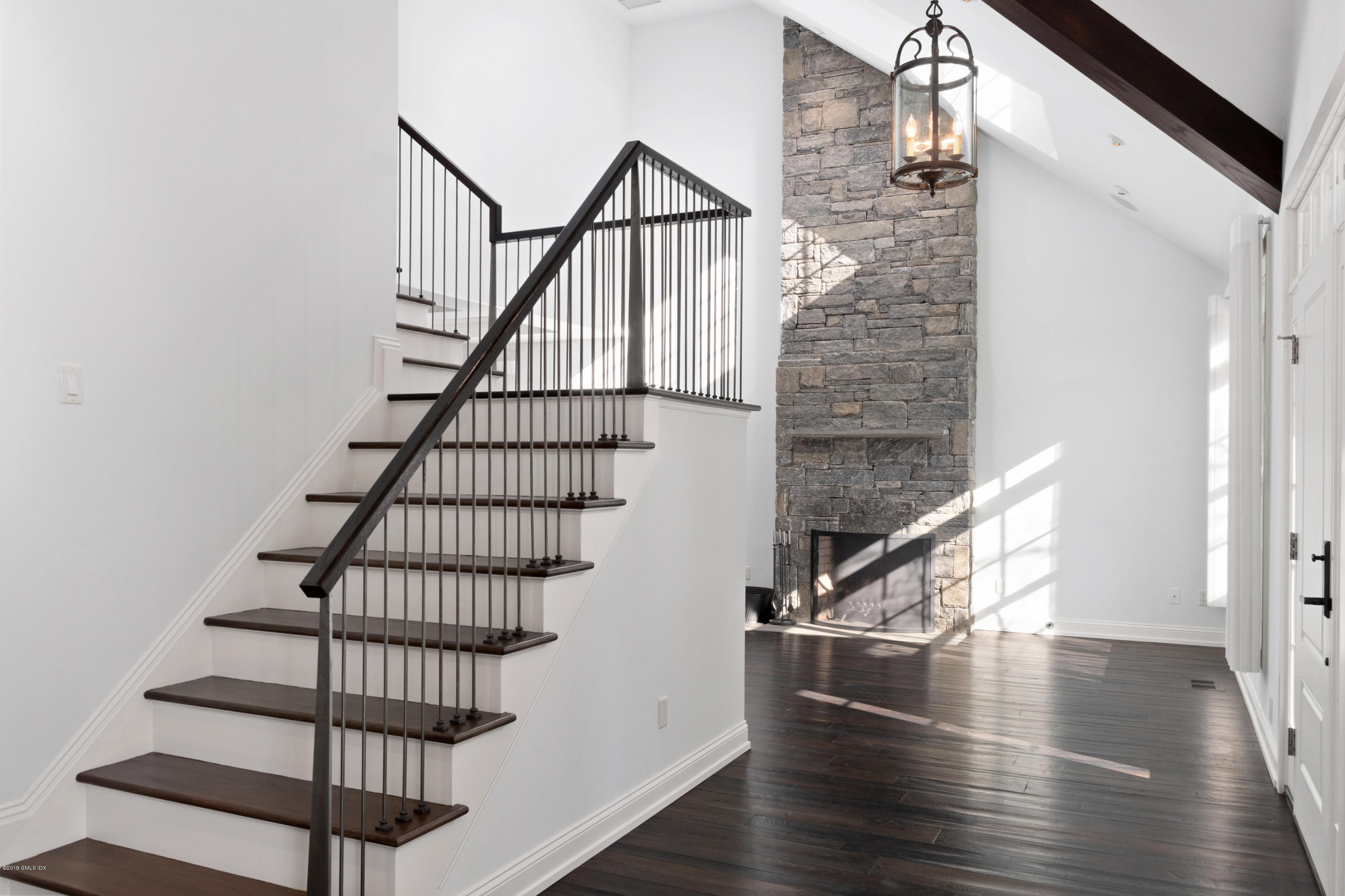 340 Valley Road, Unit 5 Cos Cob, CT 06807 - Photo 10 of 29 a view of entryway with wooden floor