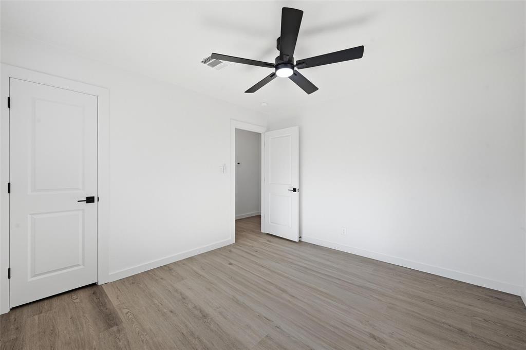 413 Wanda Way Hurst, TX 76053 - Photo 16 of 26 a view of empty room with wooden floor