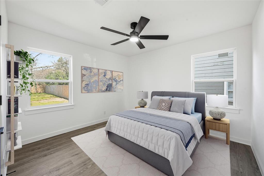 413 Wanda Way Hurst, TX 76053 - Photo 17 of 26 a bedroom with a bed and a window