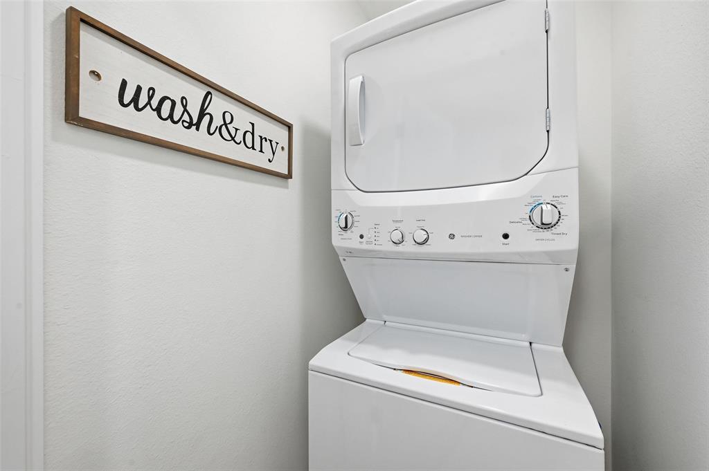 413 Wanda Way Hurst, TX 76053 - Photo 20 of 26 a close up view of a utility room with washer and dryer