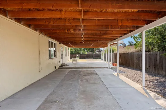 a view of backyard with porch