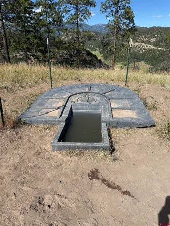 a view of a backyard of a house