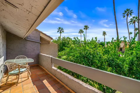 a view of a terrace with a bench