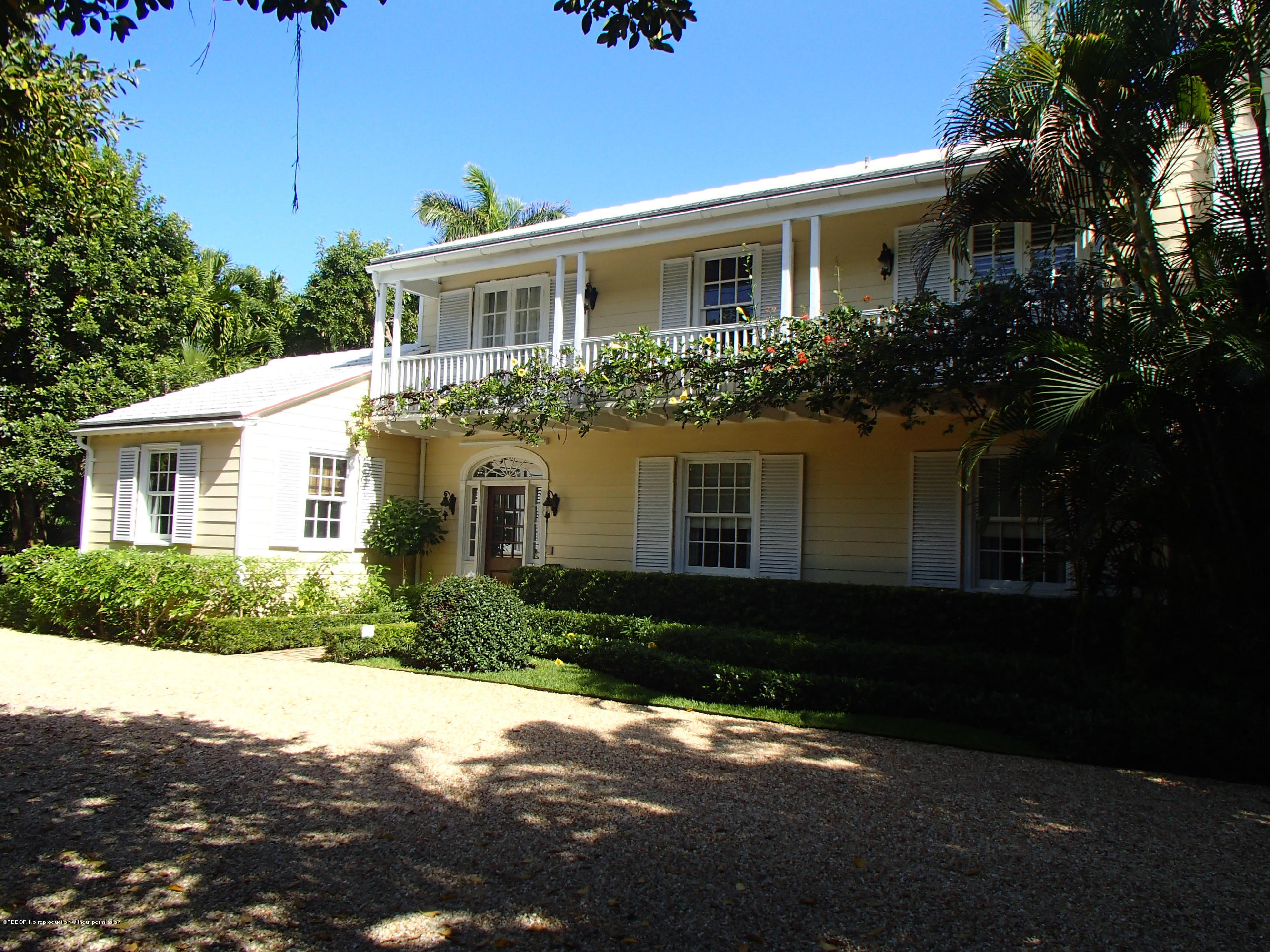 535 South County Road Palm Beach, FL 33480 - Photo 1 of 9 a front view of a house with a yard