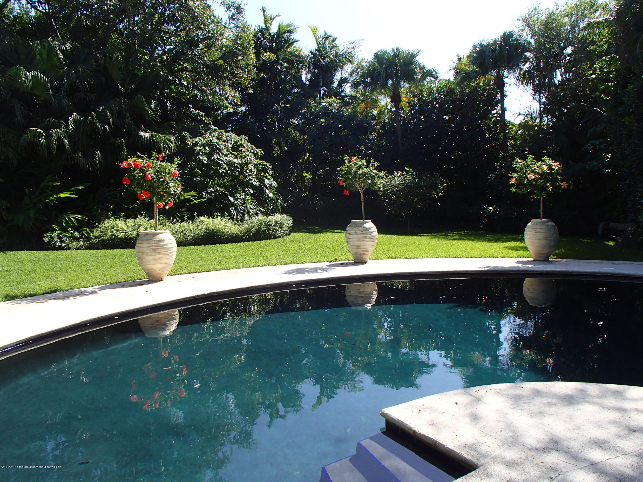 535 South County Road Palm Beach, FL 33480 - Photo 2 of 9 a view of swimming pool from a lake view