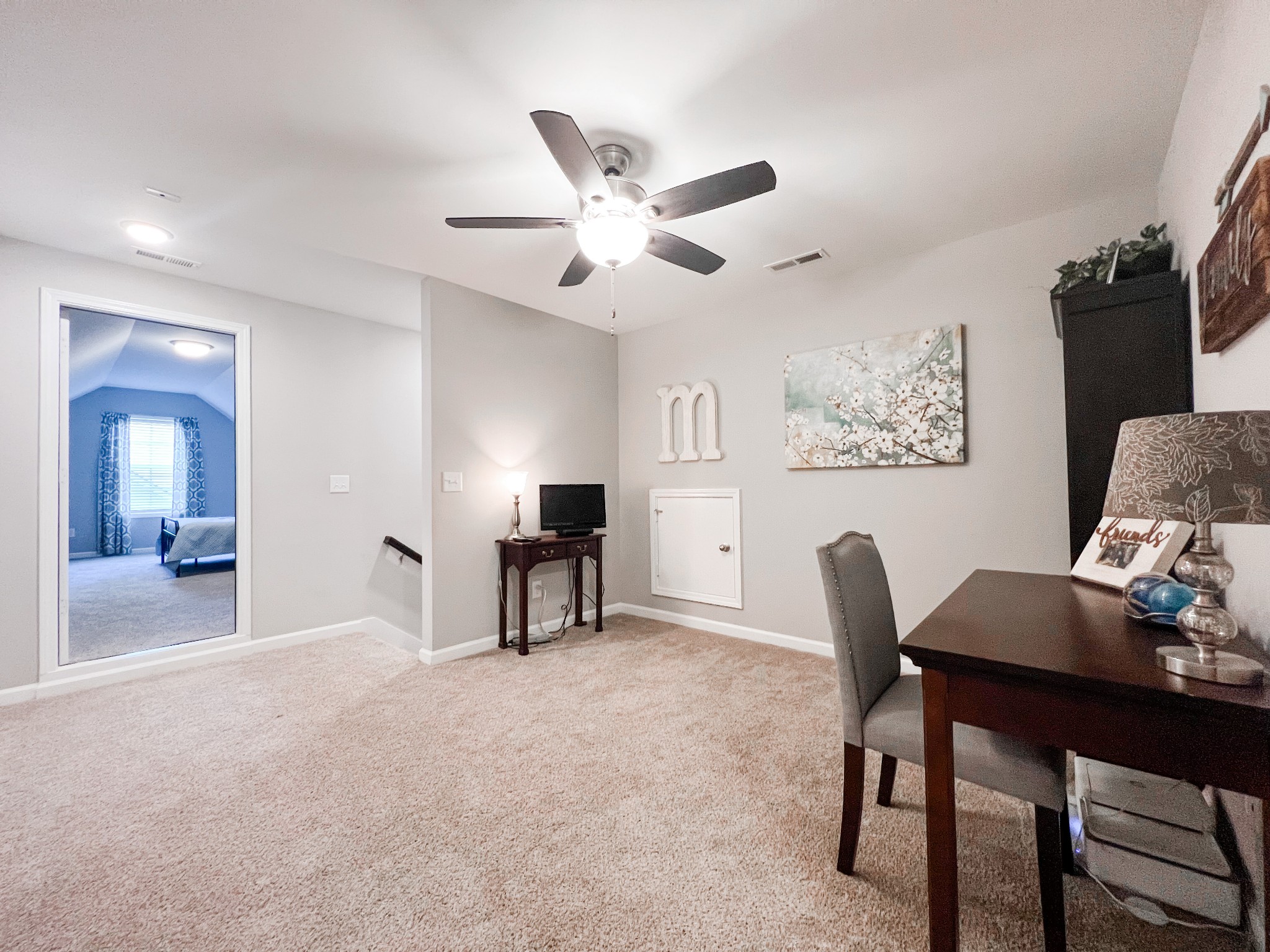 509 Skipping Stone Road Christiana, TN 37037 - Photo 23 of 33 a view of a livingroom with furniture and a flat screen tv