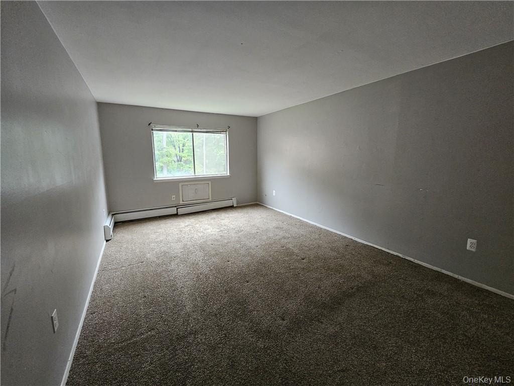 17 Tanager Road, Unit 1704 Monroe, NY 10950 - Photo 7 of 10 an empty room with windows