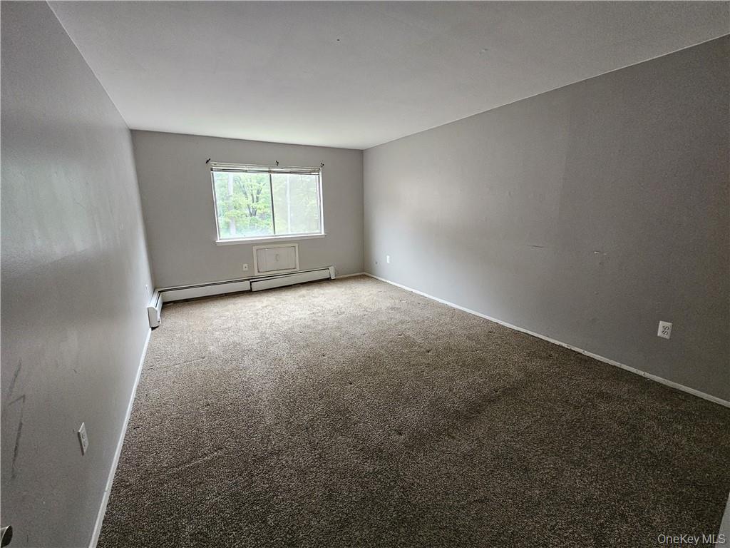 17 Tanager Road, Unit 1704 Monroe, NY 10950 - Photo 8 of 10 an empty room with windows