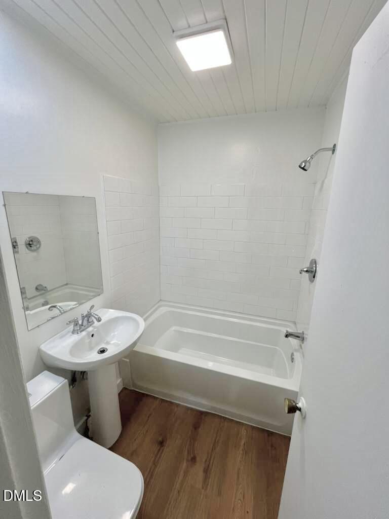 185 Summerhill Road Turkey, NC 28393 - Photo 13 of 18 a bathroom with a sink mirror vanity and toilet