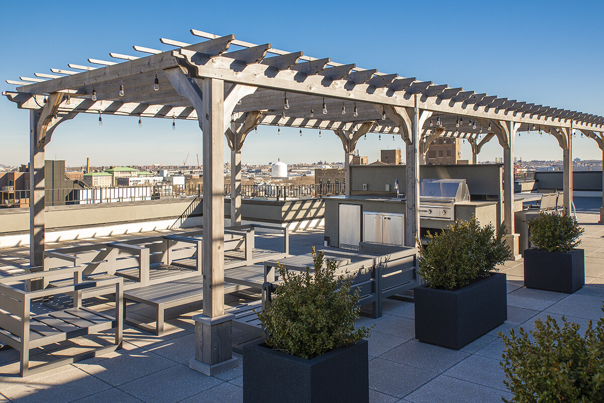 774 Grand Street, Unit 7D Brooklyn, NY 11211 - Photo 12 of 13 a view of a chairs and table in the patio and a fountain