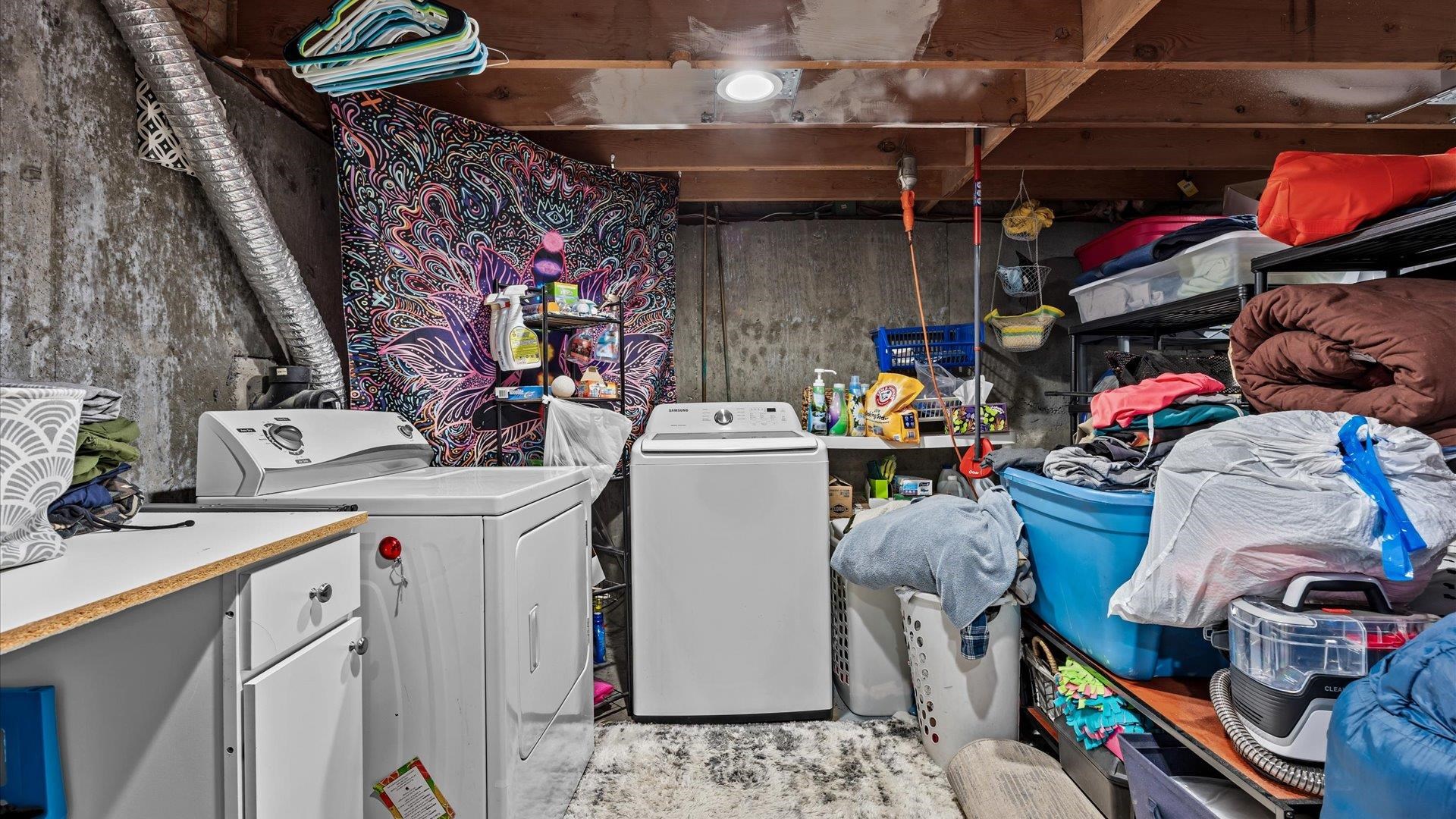 2896 Seely Road Grand Junction, CO 81503 - Photo 23 of 27 a utility room with dryer washer and other items