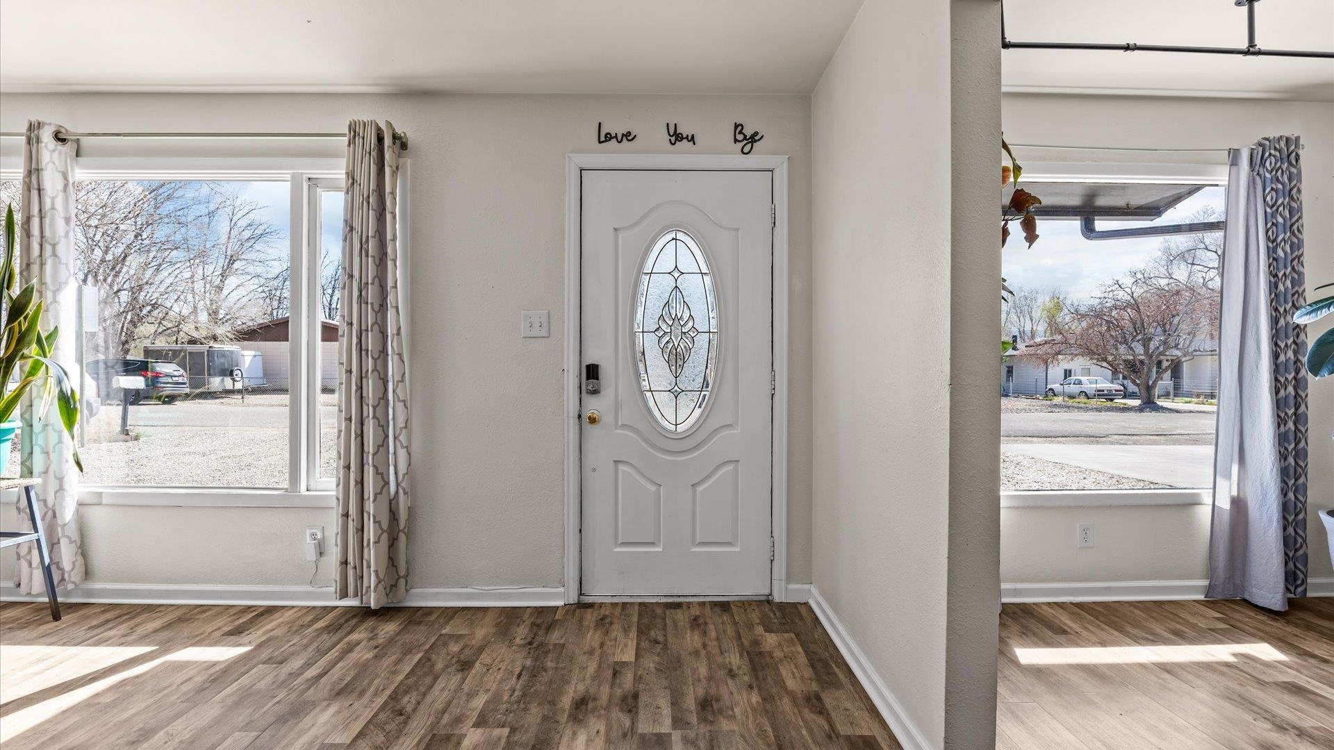 2896 Seely Road Grand Junction, CO 81503 - Photo 6 of 27 a view of room with window and hallway