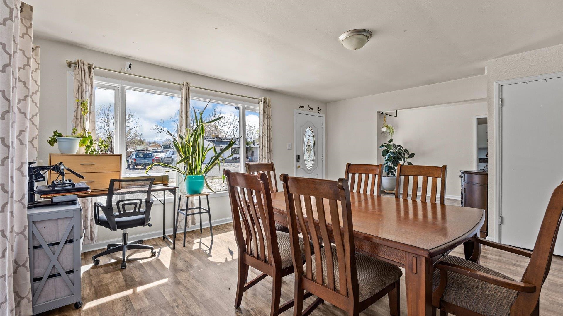 2896 Seely Road Grand Junction, CO 81503 - Photo 7 of 27 a view of a dining room with furniture window and outside view