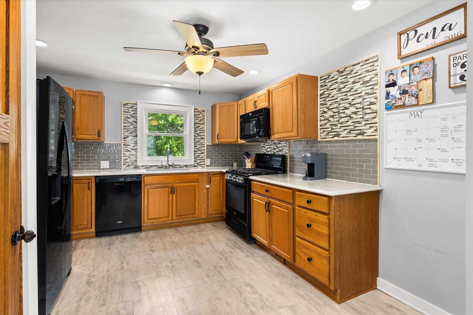 742 Chambers Street Ottawa, IL 61350 - Photo 16 of 39 a kitchen with stainless steel appliances granite countertop a stove sink and cabinets