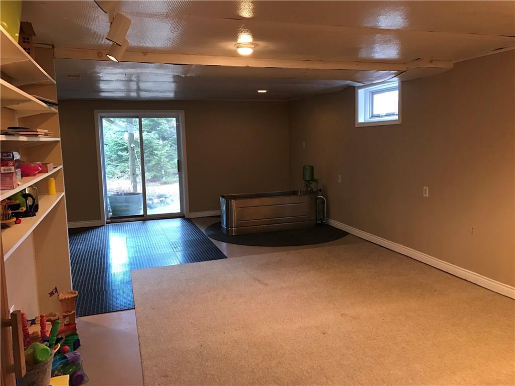 187 Shore Road Perry, ME 04667 - Photo 26 of 35 Finished basement with door handle,...