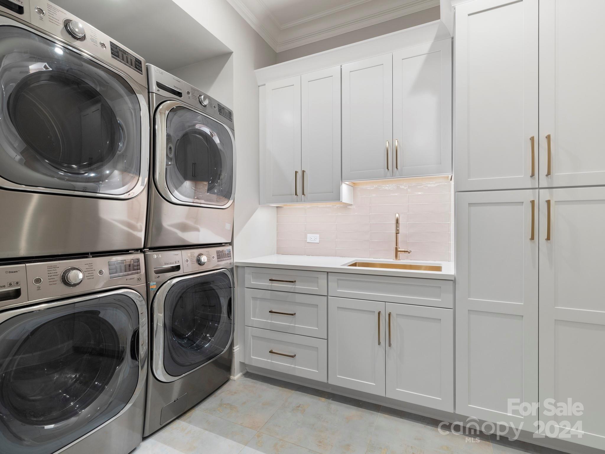 16520 Reinsch Drive Davidson, NC 28036 - Photo 16 of 37 a utility room with sink dryer and washer
