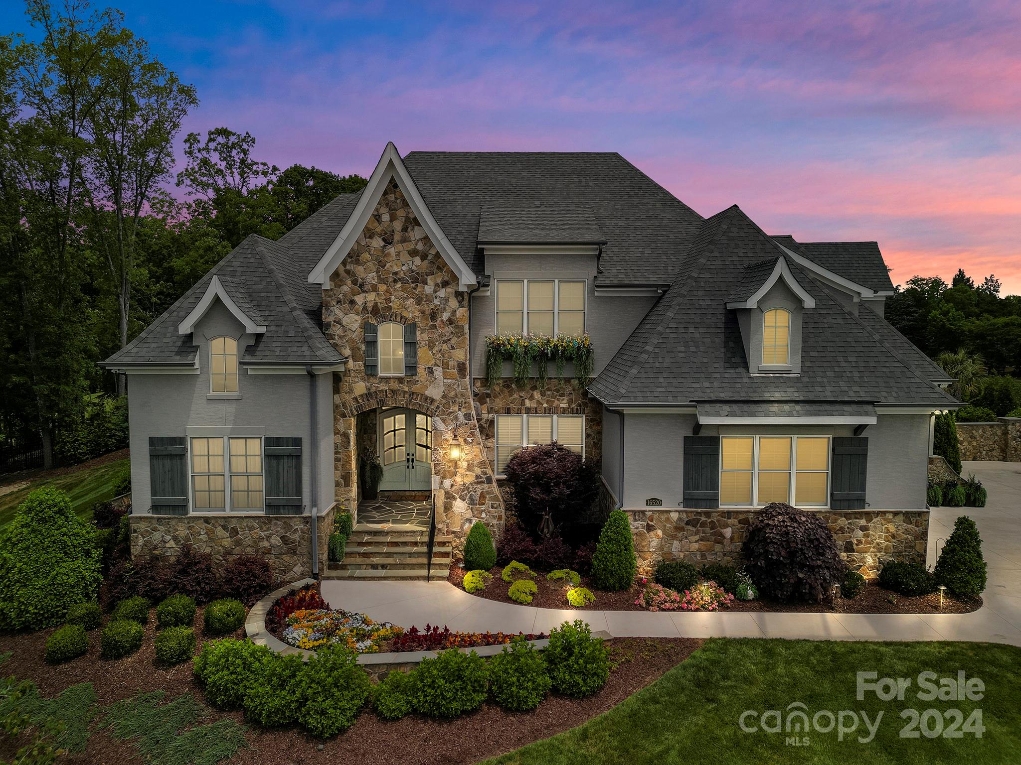 16520 Reinsch Drive Davidson, NC 28036 - Photo 2 of 37 a front view of a house with a yard