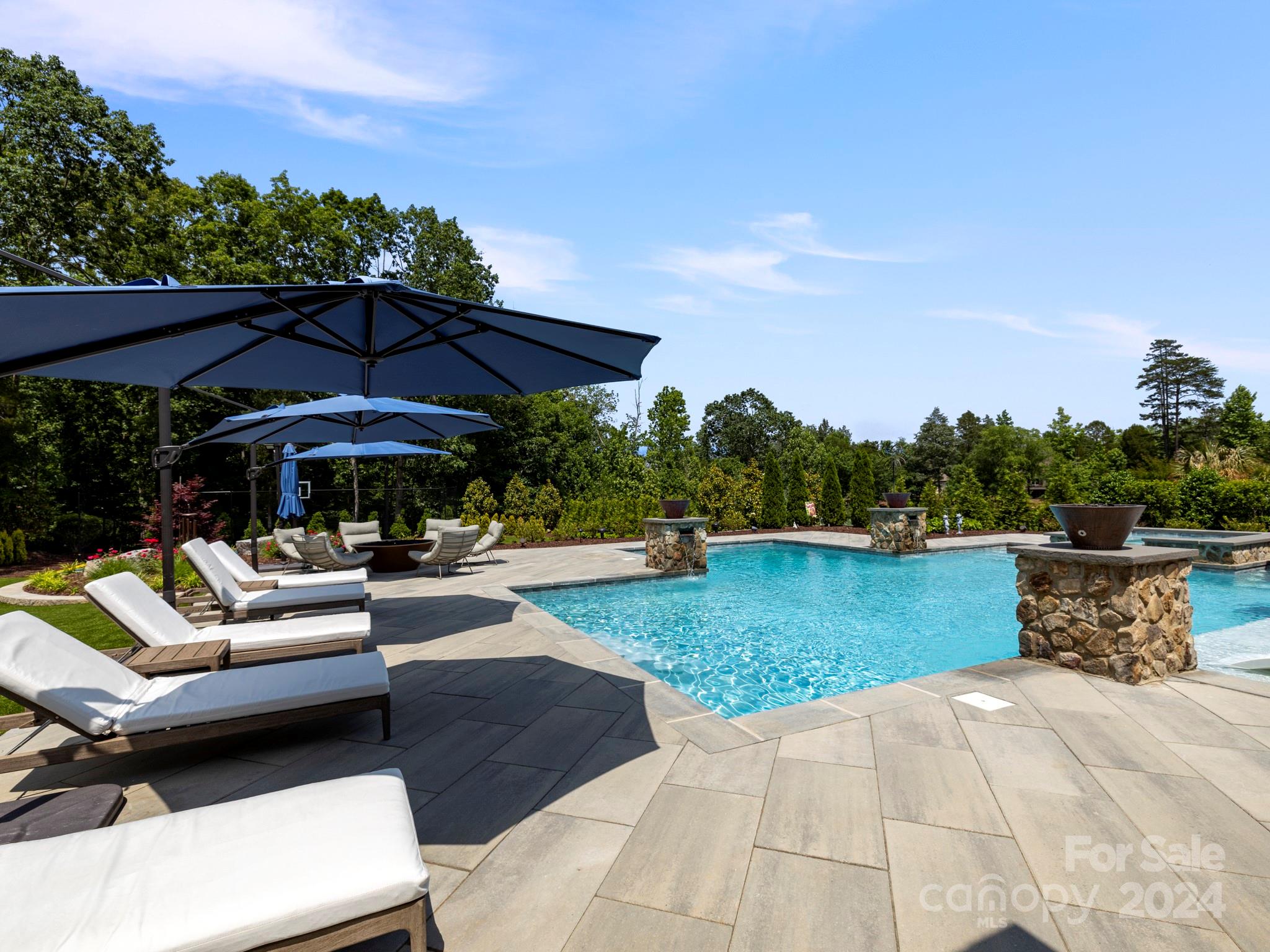 16520 Reinsch Drive Davidson, NC 28036 - Photo 27 of 37 a view of a patio with chairs and a table