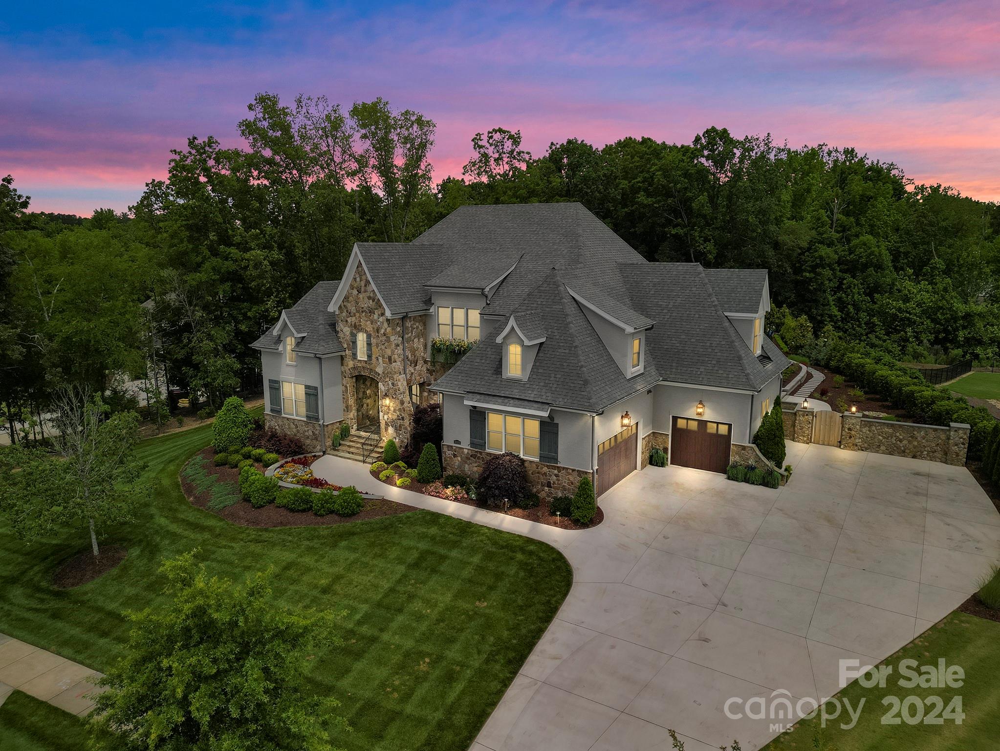 16520 Reinsch Drive Davidson, NC 28036 - Photo 3 of 37 a front view of a house with a yard