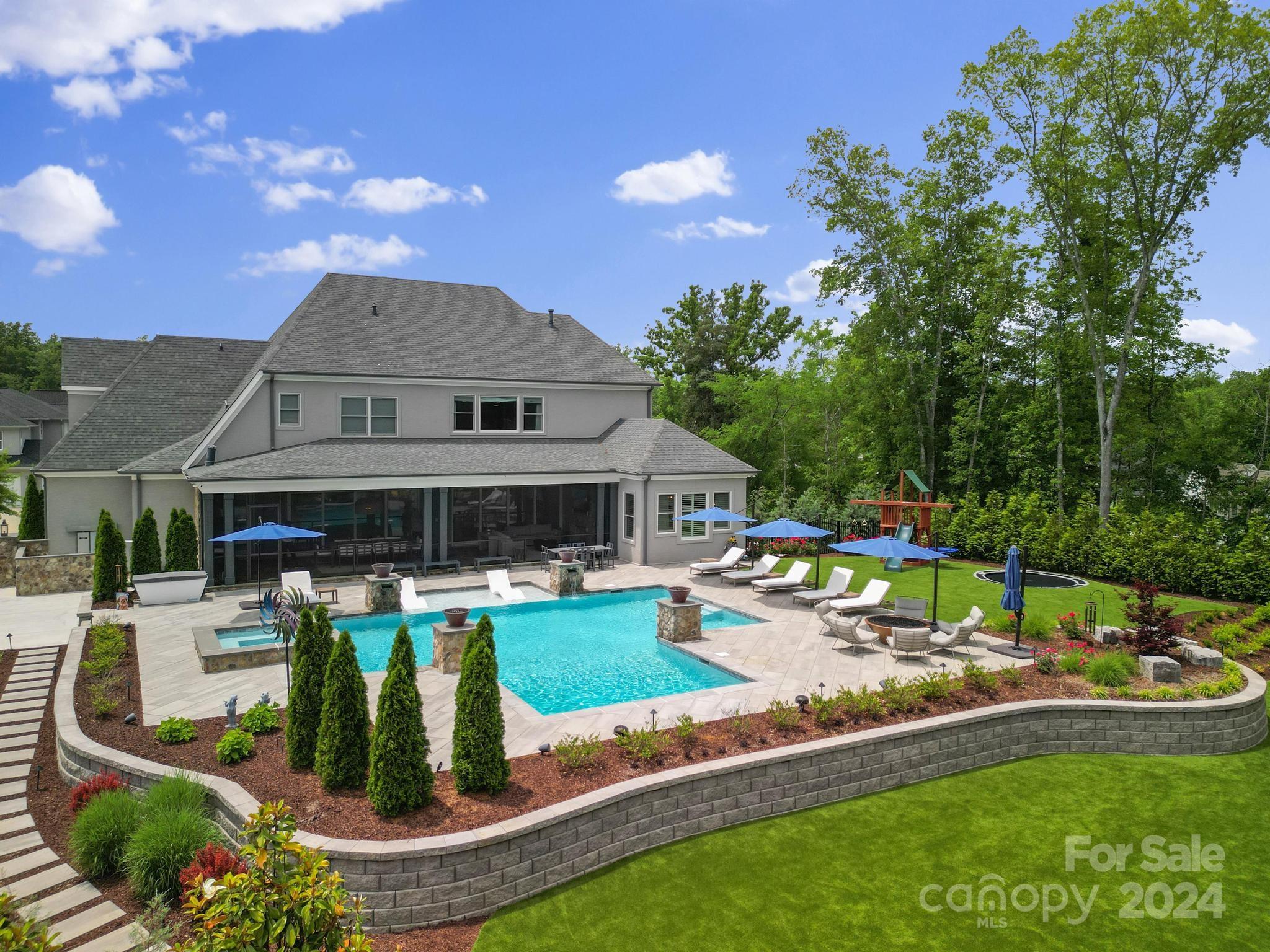 16520 Reinsch Drive Davidson, NC 28036 - Photo 34 of 37 a view of a house with swimming pool